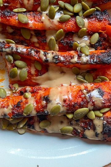 Harissa-Maple Roasted Carrots with Tahini Drizzle
