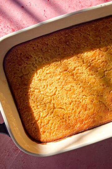 Honey miso corn pudding in a blue and white baking dish