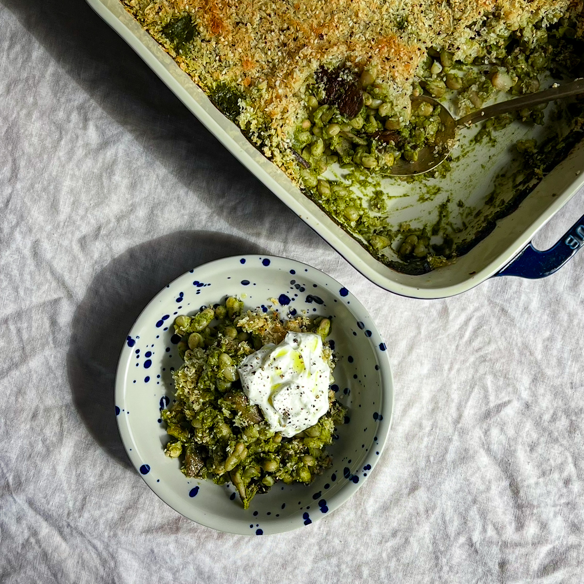 Green miso white bean gratin with mushrooms and crispy breadcrumb topping