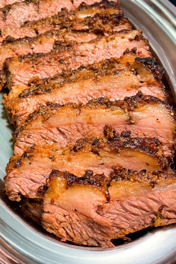 Pastrami Seasoned Brisket on a silver platter